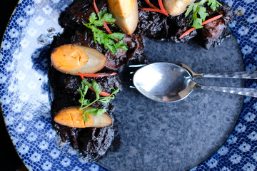 sweet savory stewed pork & egg with chinese herb spices.