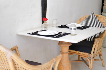 table & wicker rattan chair in cafe restaurant
