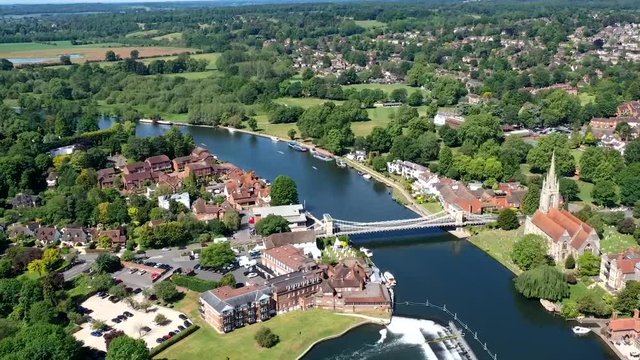 Timelapse aerial flyover captured over the River Thames at Marlow in Buckinghamshire, UK