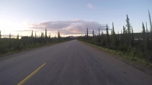 Driving towards the sun in Alaska, the gopro is attached to the car on a gimbal