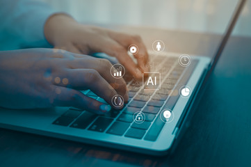 Person using a laptop computer with digital transformation change management, internet of things for new technology and business process strategy, cloud computing for bigdata, Ai technology.