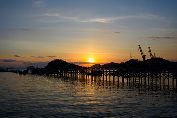 Sunset at Labuan Bajo jetty in Flores Island, East Nusa Tenggara, Indonesia