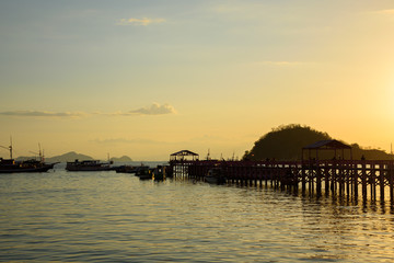 Fototapeta na wymiar Sunset at Labuan Bajo jetty in Flores Island, East Nusa Tenggara, Indonesia