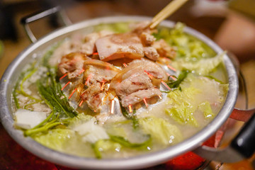 Fresh pork for pan pork. Thai Grill Pork on hot pan buffet, Moo-gata Pork pan It's traditional Thai style.