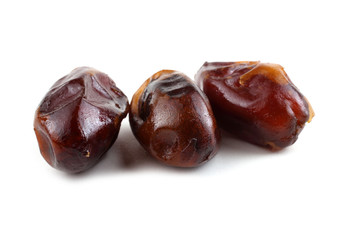 Date fruits isolated on white