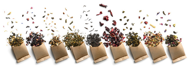 Large assortment of tea on a white background. The view from the top