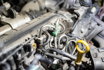 Fototapeta premium dismantled car engine in a car workshop