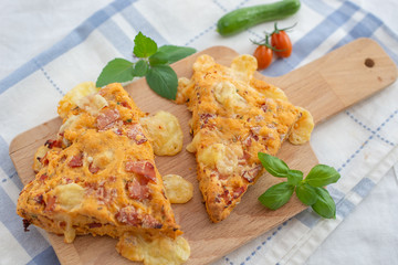 Savory cheese maffins with basil and sun-dried tomato