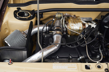 Image of the car engine. Turbocharging.