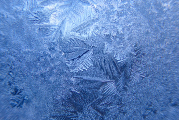 Photographing macro ice on the glass in winter Patterned like leaves