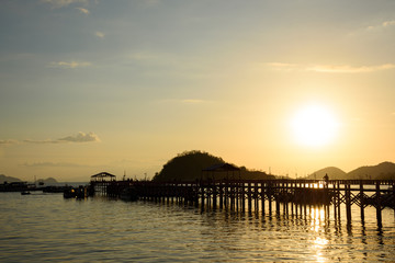 Fototapeta na wymiar Sunset at Labuan Bajo jetty in Flores Island, East Nusa Tenggara, Indonesia