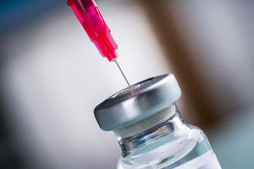 Filling Shingles Vaccine Syringe