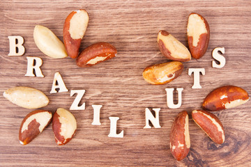 Inscription brazil nuts and fruits as source of natural minerals and vitamin
