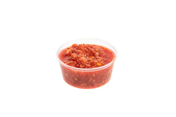 spicy meat seasonings ketchup, adjika, sauce in transparent plastic containers isolated