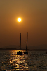 Sailing on Mediterranean Sea at sunset