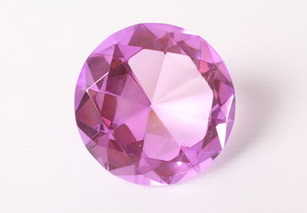 pink diamond on white surface