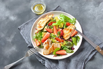 Sweet potato and carrot soup served with sour cream in wooden bowl. Orange vegetable soup concept. Vegan food