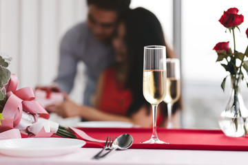 Valentine festive love theme set restaurant table for love couple dinner with champagne drink.