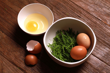 egg and acacia pennata for omelet cooking, Thai cuisine - calls that cha-om omelet