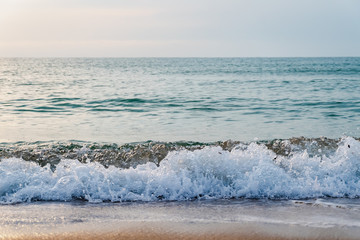 Sunset over the sea and islands beautiful golden yellow. Beach, sea, sandy beach. On twilight. Nature background