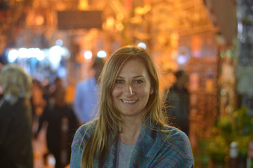 the happy girl among the colors of the souk