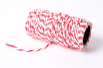 Parcel red and white rope