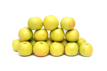 group of yellow apples on a white background, live vitamins, natural iron in fruits