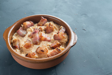 mashed potatoes with slice of bacon