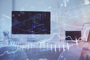 Forex Chart hologram on table with computer background. Multi exposure. Concept of financial markets.