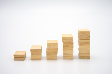 Money, Financial, Business Growth concept, stack of wood Investment Analysis Or investment. The...