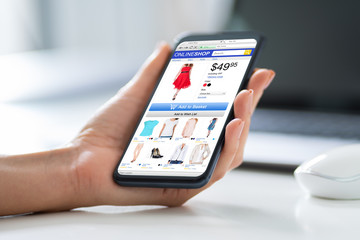 Person Doing Shopping Online On Mobilephone