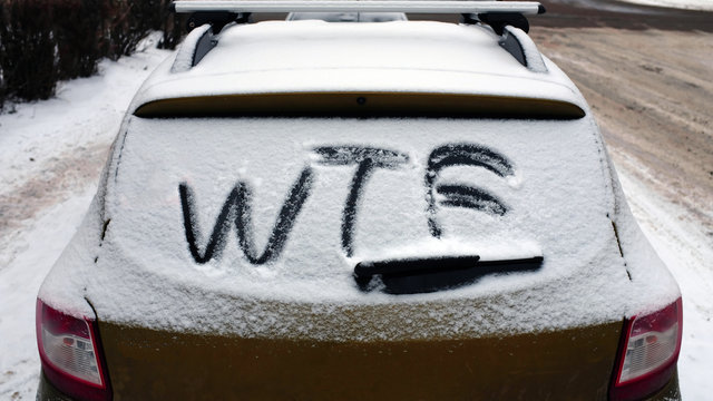 frozen car glass with the inscription  wtf