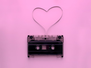 audio cassette with magnetic tape in shape of heart