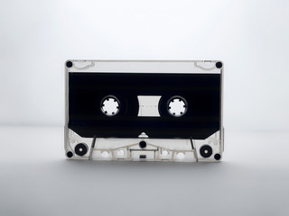 audio cassette on a white background. back light