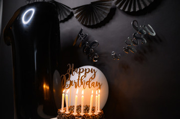 birthday first black balloon cake