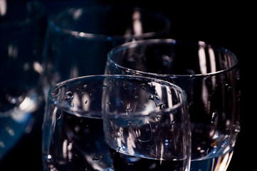 Stylish glass goblets for an evening party or holiday. Items that create a romantic atmosphere