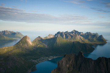Dramatic peaks of mountains in Senja Island, Norway. Landscape fjords in background.