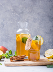 Healthy tea kombucha with lemon and cinnamon.