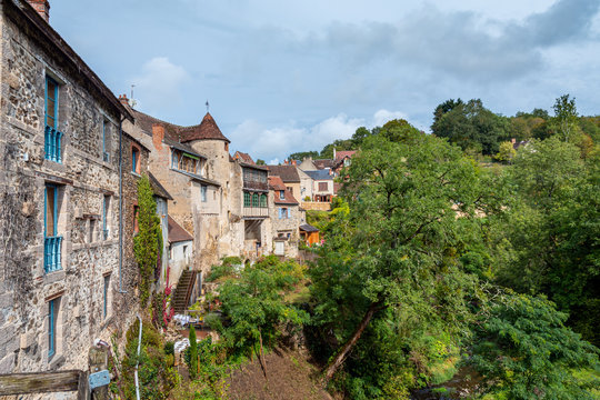 Terrace houses facing a forest in the medieval village of Gargilesse-Dampierre in central France