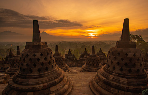 the biggest Buddhist temple in the world. Borobodur temple during sunrise with stunning colours and many stupas located close to Yogyakarta on Java, Indonesia