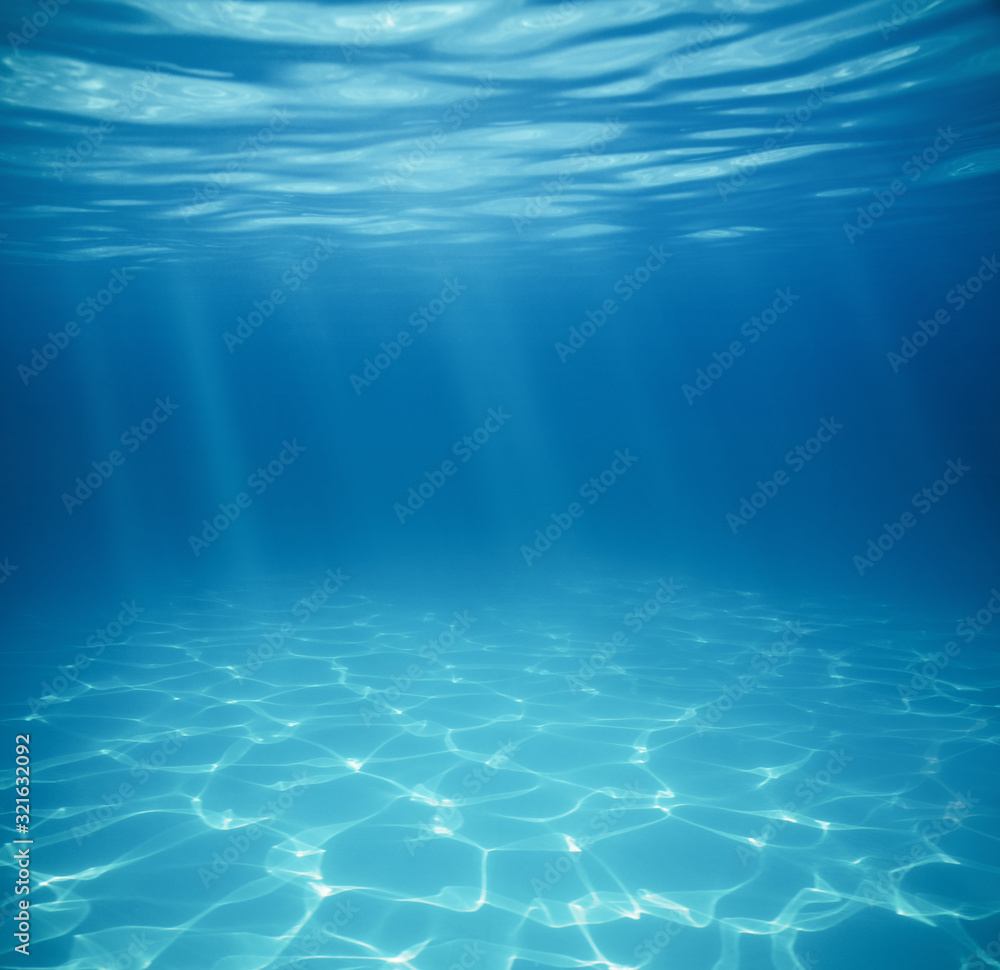 Wall mural underwater empty swimming pool background with copy space