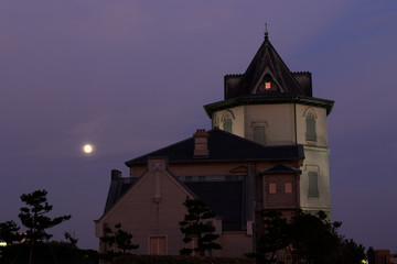 Fototapeta na wymiar Sun Yat-sen Memorial Hall illuminated by the moon at Maiko,Kobe