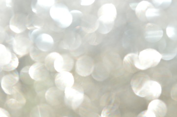 Abstract glittering sheet bokeh reflected in sunlight