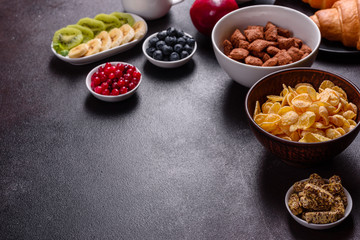 Delicious breakfast with fresh croissants and ripe berries