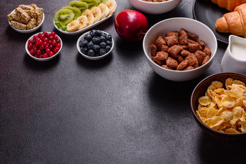 Delicious breakfast with fresh croissants and ripe berries