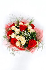 bouquet of roses in vase isolated on white