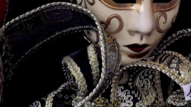 Close up of traditional Venetian mask and costume