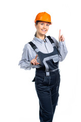 Young female architect dancing looking at camera with a smiling facial expression. Isolated