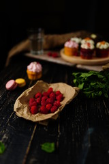 Fototapeta na wymiar Raspberries in powdered sugar