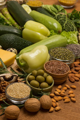 Set of healthy food: cheese, green vegetables, nuts and seeds